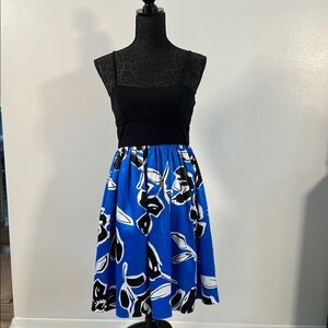 Intrigue woman’s Chic Black and Blue Floral A-Line dress. Size 6